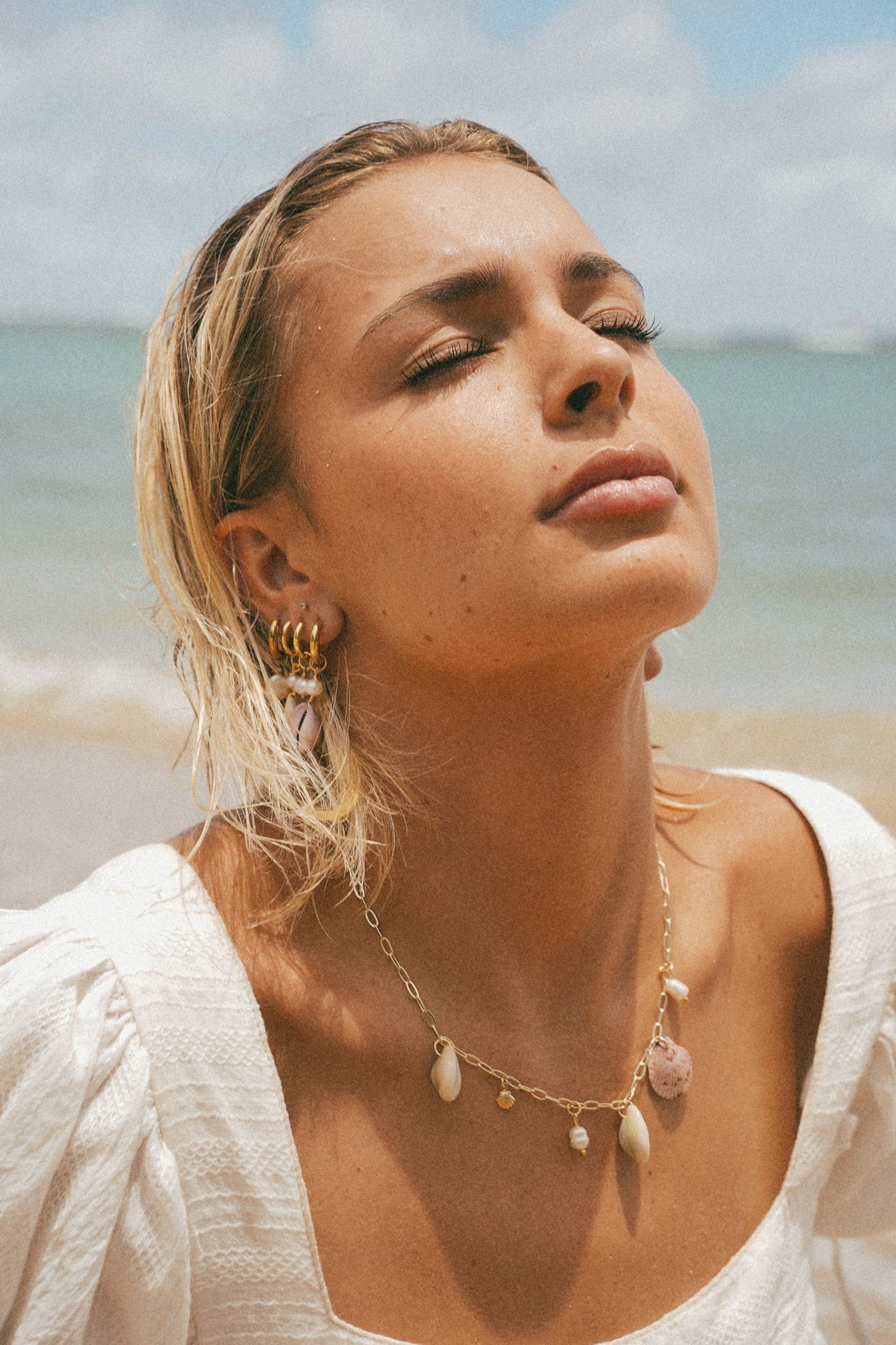 The Anini Gold Calico Shell Charm Necklace