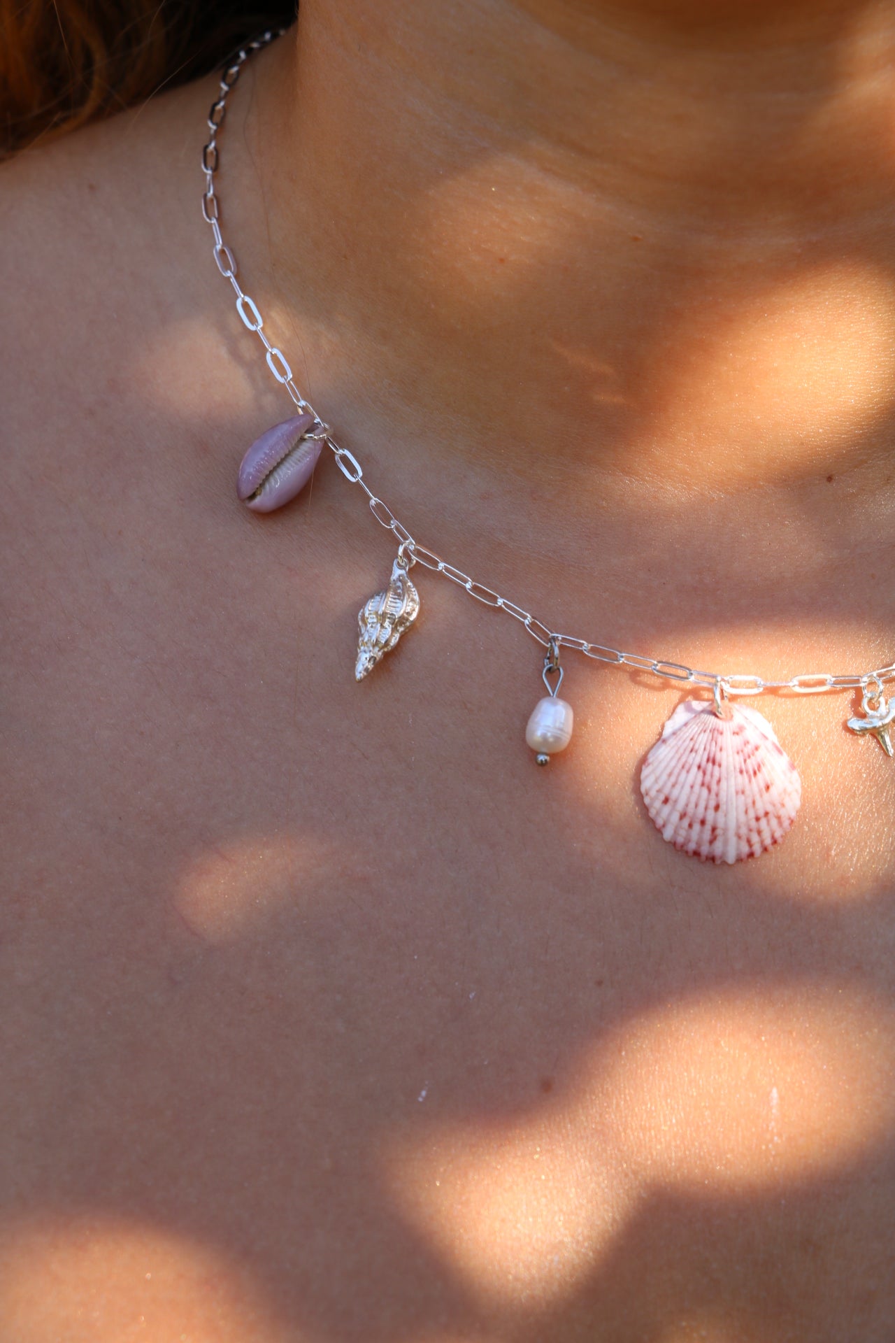 The Asali Silver Calico Shell Charm Necklace