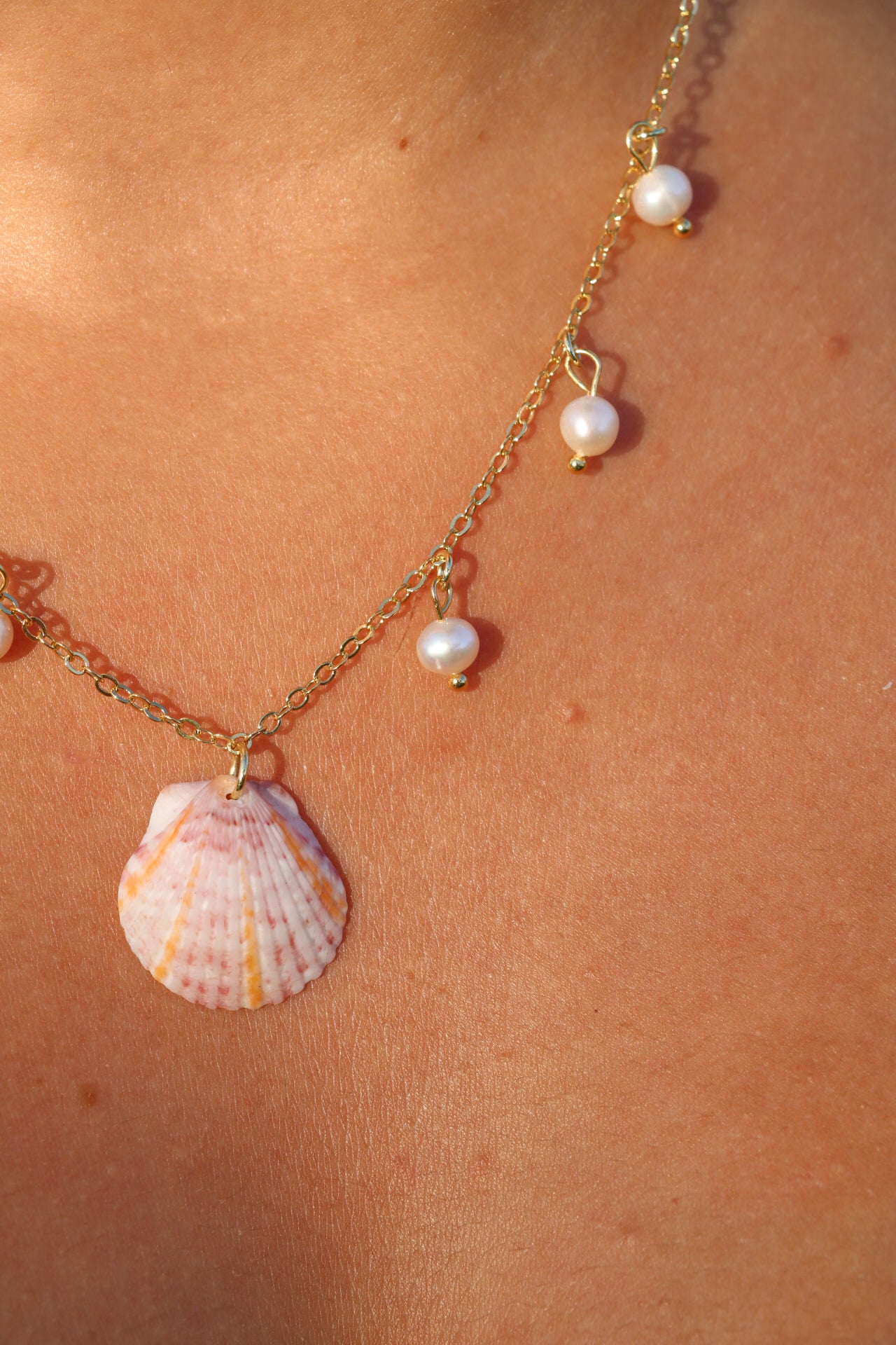 Gold Sun Rays Calico Shell Pearl Charm Necklace